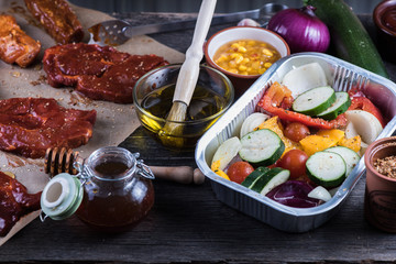 Pork in sticky glaze and fresh vegetables for home party barbecu