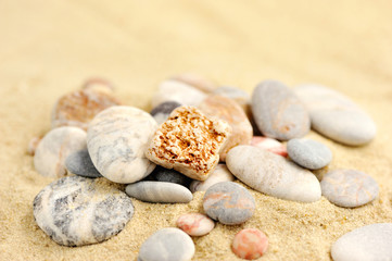 Fototapeta na wymiar Group stones on the sand
