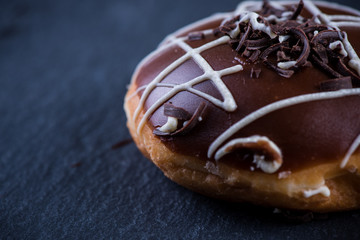 close view on hand decorated artisan donut