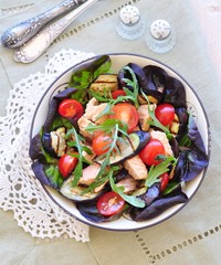 vegetarian salad with grilled eggplant, salmon and lentils