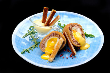 Egg baked in a meat patty