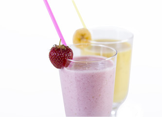 Milk shakes from different fruits isolated on white