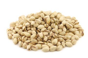 Pistachio nuts on a white background