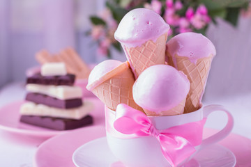 Strawberry Ice Cream in a waffle cones