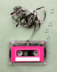 Vintage looking Magnetic tape cassette for audio music recording with song note blow out