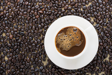 cup of coffee and coffee beans