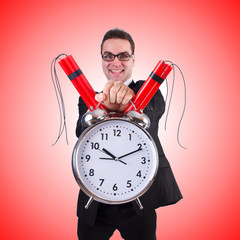 Man with time bomb isolated on white