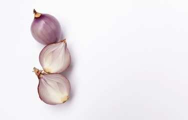 Fresh red onion with space on white background