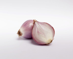 Red onion on white background