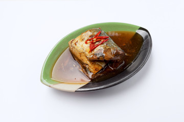 Saba fish in teriyaki sauce on white background