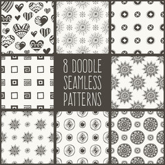 Vector set. 8 doodle seamless patterns