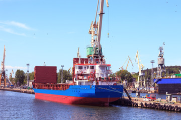 Fototapeta premium Cargo ship in port of Gdynia, Poland.