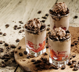 Delicious coffee and chocolate ice cream with strawberries, sele