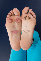 Happy and funny couple summer feet