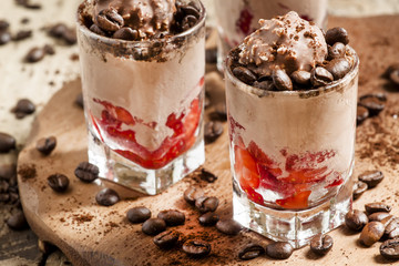 Delicious coffee and chocolate ice cream with strawberries, sele