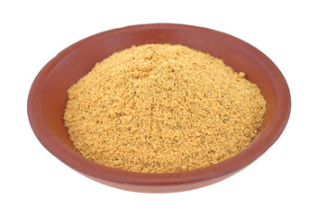 Powdered fajita seasoning mix in a small bowl