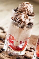 Delicious coffee and chocolate ice cream with strawberries, sele