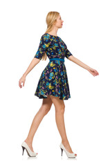 Fototapeta premium Woman in dark blue floral dress isolated on white