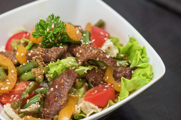 Warm salad with veal