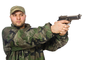 Solider holding gun isolated on white