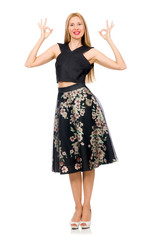 Woman in floral dark skirt isolated on white