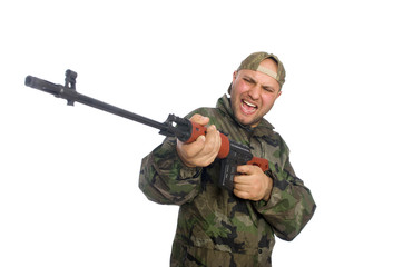 Young man in soldier uniform holding gun isolated on white