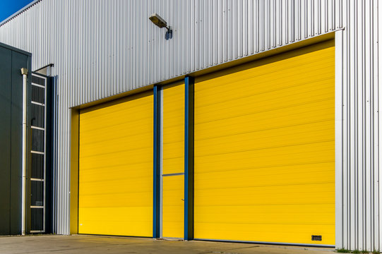 two yellow doors in a business building