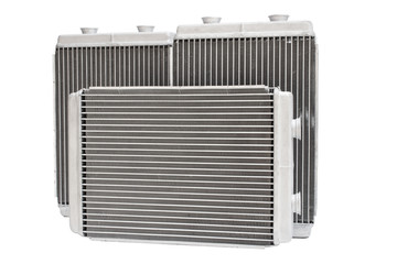 Fototapeta premium three new automotive radiator stove on a white background
