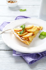 slice of apple tarte with cinnamon, mint