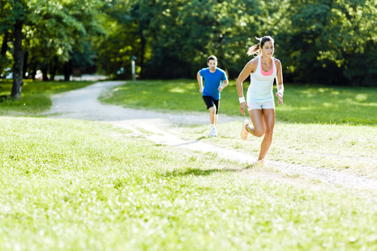 Young people running in nature