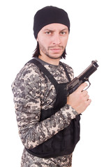 Young man in military uniform holding gun isolated on white