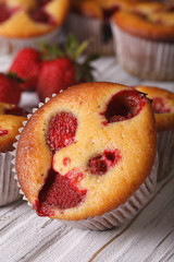 strawberry muffin macro on the table. vertical