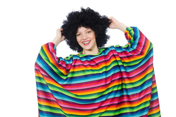 Pretty girl in mexican poncho isolated on white