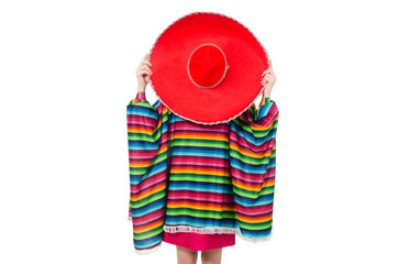 Pretty girl in mexican poncho isolated on white