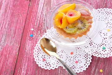 sweet cake with fruits on plate