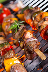 Vegetable and meat skewer on grill
