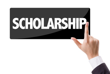 Businessman pressing button with the text: Scholarship