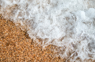 Fototapeta na wymiar background with seashell sand and water of wave