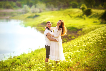 Beautiful pregnant woman with her husband