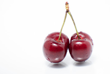 duas cerejas isoladas