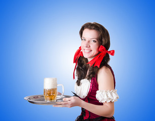 Bavarian girl with tray on white