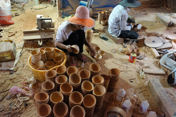Asian worker, wood workshop, coconut product
