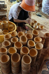 Fototapeta na wymiar Asian worker, wood workshop, coconut product