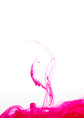 pink ink spread in water