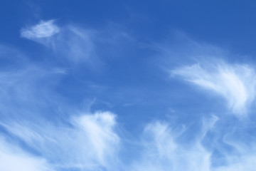 White clouds in a blue sky