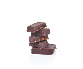 chocolate pieces on white background