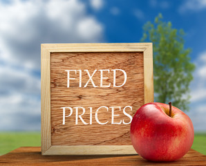 Red apple with wooden frame