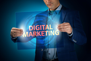 Businessman holding a transparent screen with an inscription a d