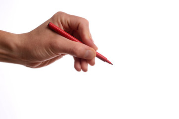 Hand with a red pen