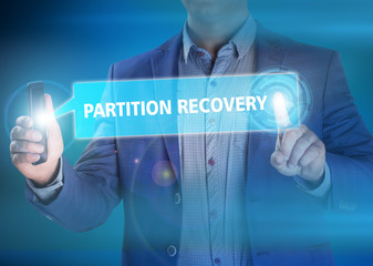 Businessman presses button partition recovery on virtual screens